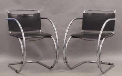 After Ludwig Mies Van Der Rohe, a pair of MR20 style armchairs, circa 1970, with black leather seats on chromed tubular frames, together with an armchair after Marcel Breuer (3)