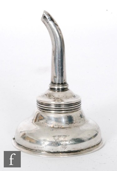 An 18th Century Irish hallmarked silver wine funnel of plain...