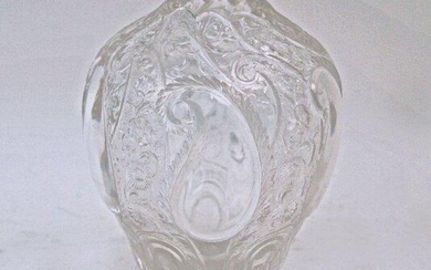 An English glass vase, late 19th century, possibly by Stevens & Williams, the ogee body intaglio engraved in the manner of John Orchard with chrysanthemums and other flowers between leaf panels, on flower head base, 16cm high