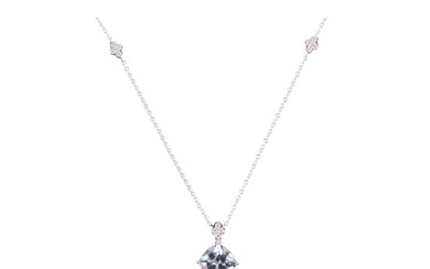 An aquamarine and diamond necklace, featuring a cushion cut ...
