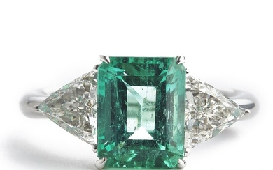 NOT SOLD. An emerald and diamond ring set with an emerald-cut emerald weighing app. 3.11...