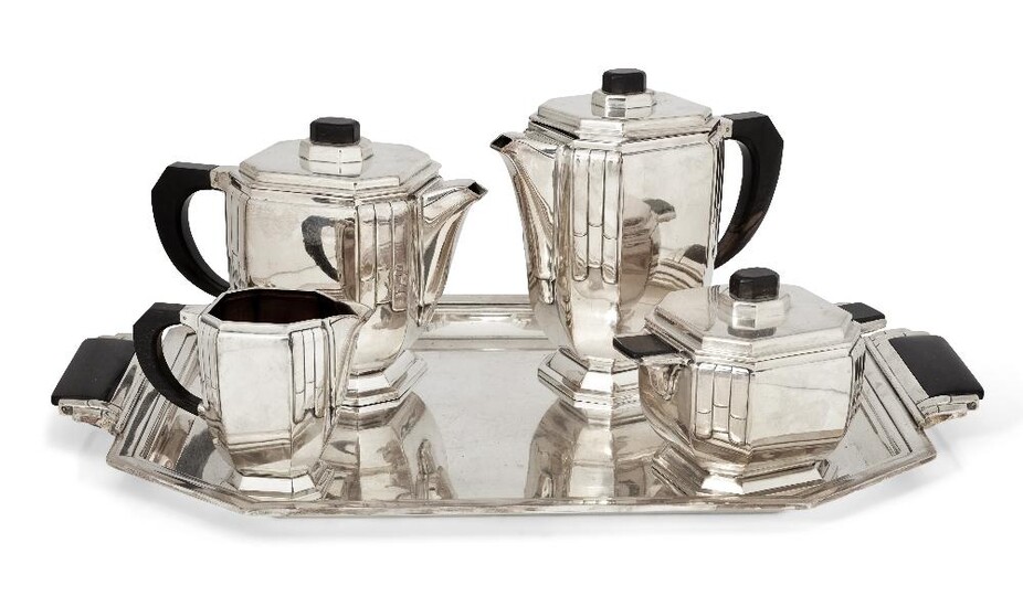Argental, French Art Deco coffee and tea set, circa 1930, Silver plated metal, ebony, Each part stamped with manufacturer's marks, Tray : 55cm x 34cm ; Coffee pot : 20.5cm high ; Teapot : 17cm high ; Milk jug : 10.5cm high ; Sugar pot : 12cm high