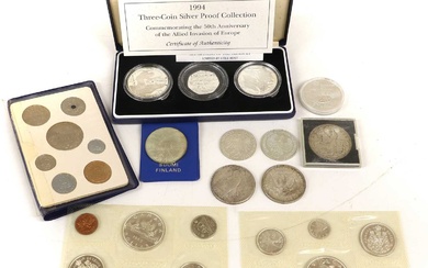 Assorted UK and World Silver Coins, comprising; 1994 three-coin silver...