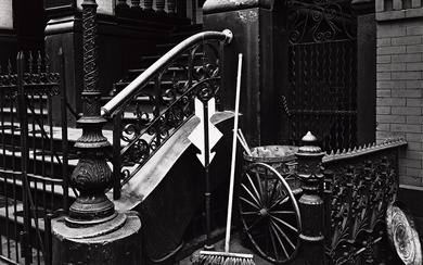 BRETT WESTON (1911-1993) Stairway with Broom, New York. Silver print, the image measuring...