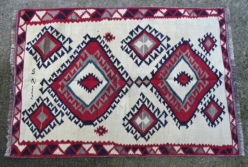 Carpet / Rug : A Qashqai kilim, the cream ground with