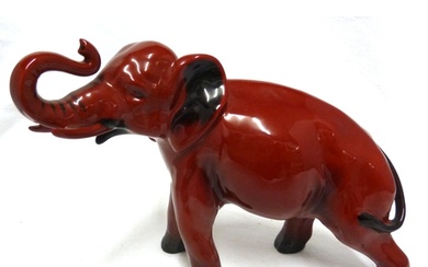Charles Noke for Royal Doulton - a red flambe figure of an e...
