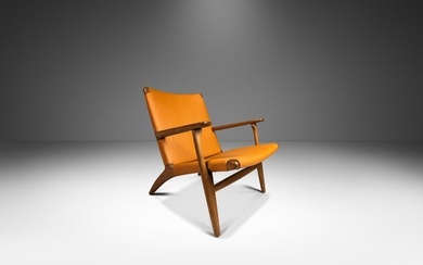Danish Mid-Century Modern Model CH 25 Lounge Chair in Oak and Leather by Hans J. Wegner for Carl