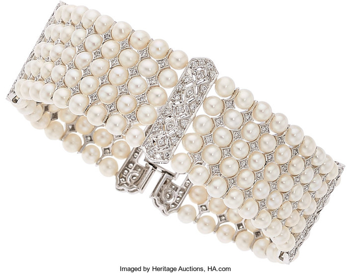 Diamond, Cultured Pearl, White Gold Bracelet The bracelet...