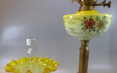 Early 20th Century double oil burner lamp, having yellow...