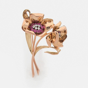 FLOWER BROOCH A ruby, diamond and gold brooch....