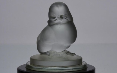 Ferjac Glass (Early 20th C) Frosted glass figure of a chick munted on black glass base, signed. Circa 1930. Height 11 cm.