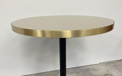 NOT SOLD. GUBI 2.0 dining table, safari beige glass top, black painted base. Manufactured by Gubi. H. 73. Diam. 80 cm. – Bruun Rasmussen Auctioneers of Fine Art