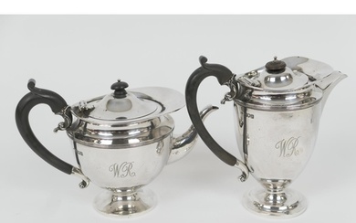 George V silver teapot and matching hot water jug, by Hollan...