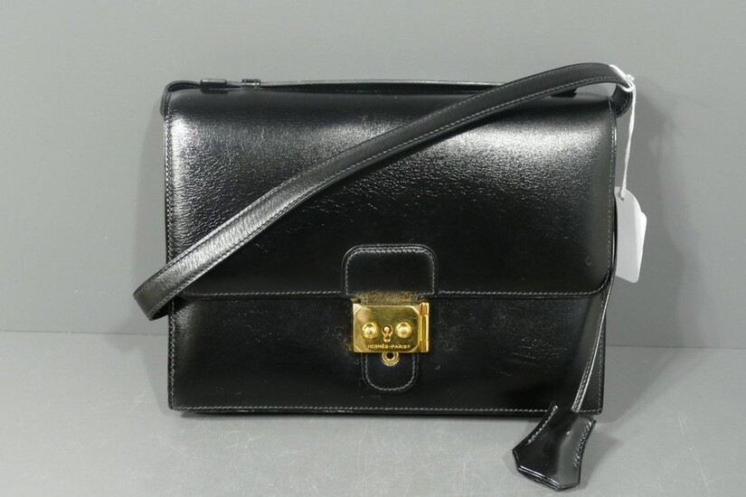 Hermès black leather messenger bag with removable shoulder strap, key, bell and dustbag