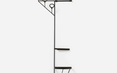In the manner of Jacques Adnet, Wall rack