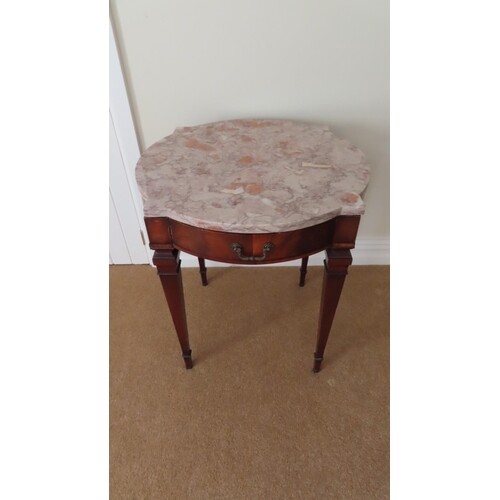Marble top circular table with single drawer and square tape...