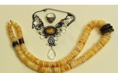 Necklace, ring, pendant on a chain with Baltic amber