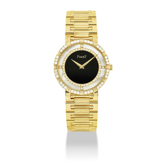 PIAGET, GOLD, DIAMOND-SET, MOTHER-OF-PEARL AND ONYX