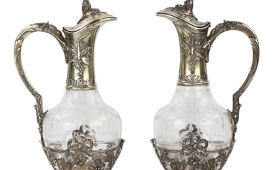 Pair of French glass wine jugs in silver from the...