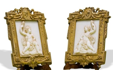 Pair of frames with marble bas-relief