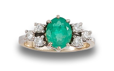 RING OF DIAMONDS AND EMERALDS, IN WHITE GOLD