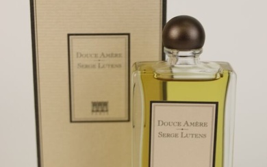 Serge Lutens - "Douce Amère" - (2002) Flacon vaporisateur contenant 50ml d'Eau de Parfum présenté...