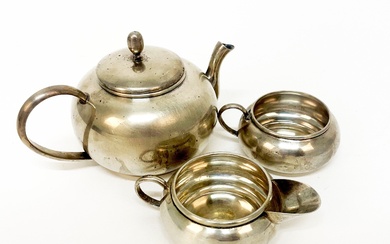Silver teapot, milk jug and sugar bowl