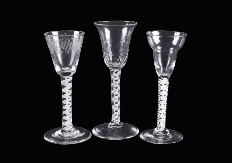 Three opaque-twist wine glasses