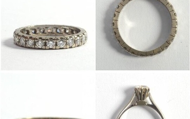 Two rings: an American wedding band set with...