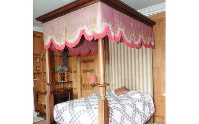 Victorian walnut framed four poster bed with turned and shap...
