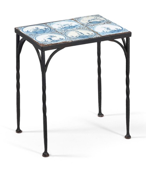 WROUGHT IRON TABLE INSET WITH SIX 18TH CENTURY BLUE AND WHITE DELFT TILES Each tile depicts an animal in a landscape. Later wrought...
