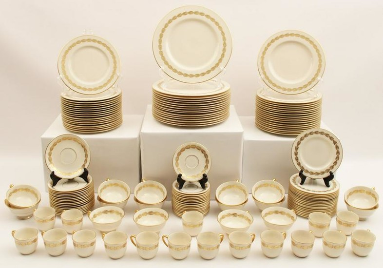 128 + pc. Bone China gold rimmed dinner service by