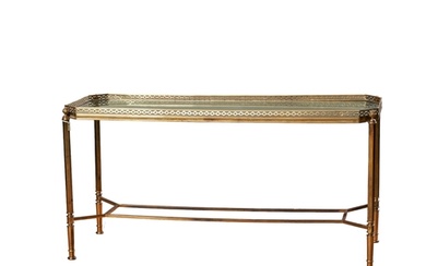 20th Century A brass and glass coffee table Dimensions: 19....