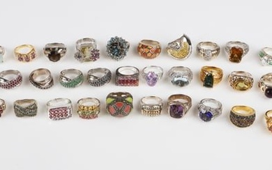 (35) Sterling and stone rings, coordinated earrings