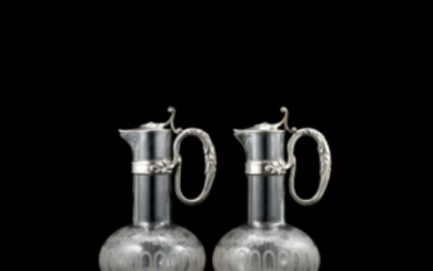 A pair of silver mounted crystal ewers. Late 19th century-early 20th century, silversmith Gustave Keller (Keller Frères, 1881-1922) (h. cm...