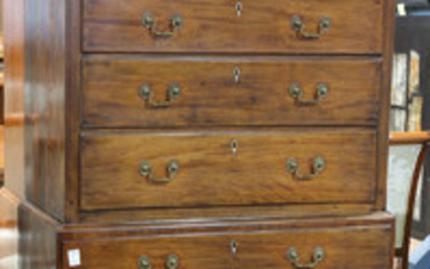 English Sheraton chest on chest, last quarter 18th century, having a molded crest surmounting the graduated eight drawer case having...