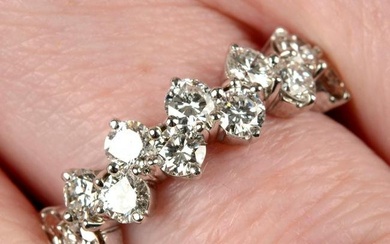 A 1970s 18ct gold brilliant-cut diamond undulating line ring, by Kutchinsky.Estimated total diamond