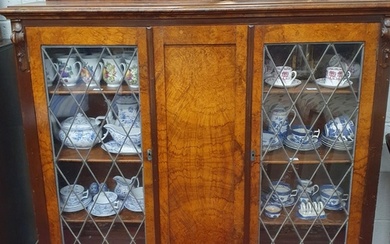 A 19th Century Walnut two door Display Cabinet with glazed l...