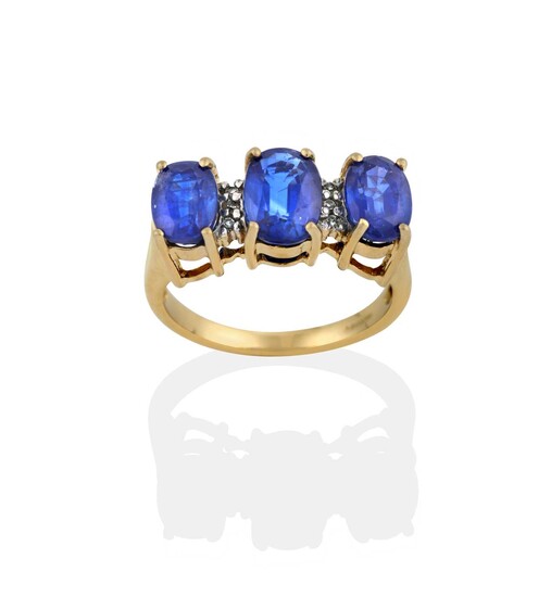 A 9 Carat Gold Sapphire and Diamond Ring