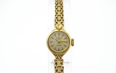 A 9ct gold cased ladies wristwatch by Rotary with 9ct gold b...