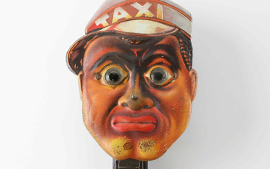 A 'Amos N Andy' metal toy, Germany, 1930s.