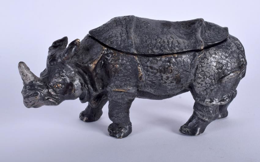 A BRONZE INK WELL IN THE FORM OF A RHINOCEROS, modelled