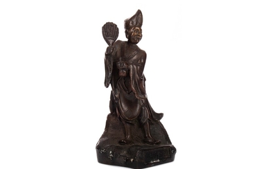 A CHINESE BRONZE FIGURE