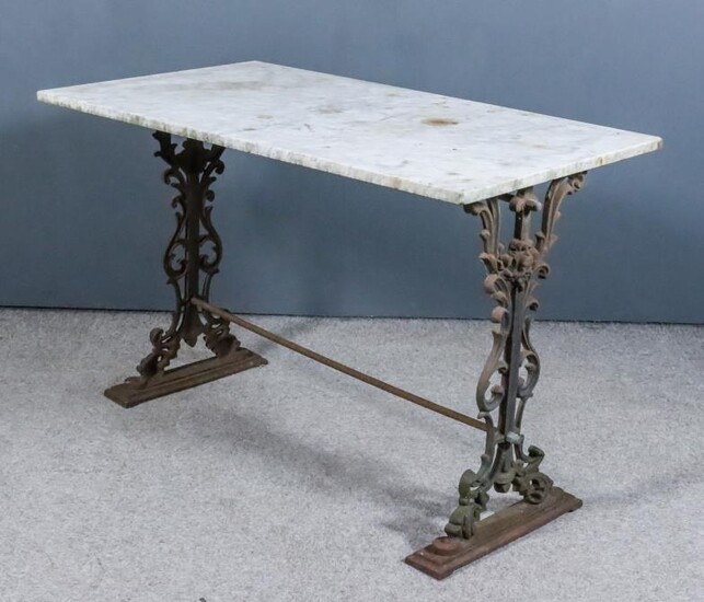 A Cast Iron Rectangular Garden Table, with white veined...