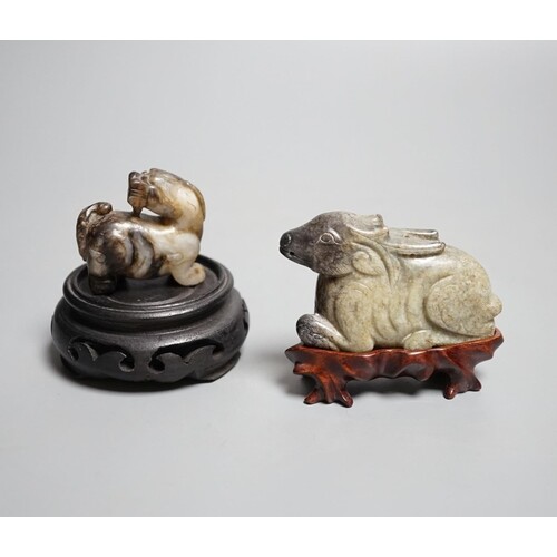 A Chinese chicken bone jade deer and a grey and black jade b...