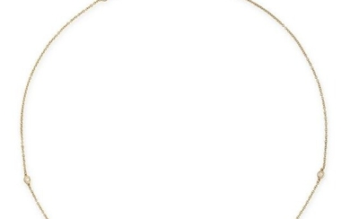A DIAMOND NECKLACE in 18ct yellow gold, the trace chain set with seven round brilliant cut diamonds