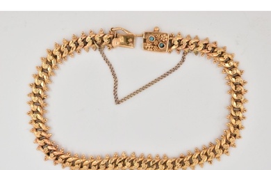 A FANCY LINK BRACELET, the curb link bracelet with beaded fl...