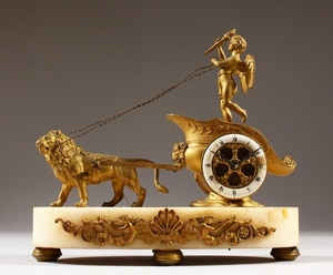 A FRENCH 19TH CENTURY GILT METAL AND MARBLE CLOCK
