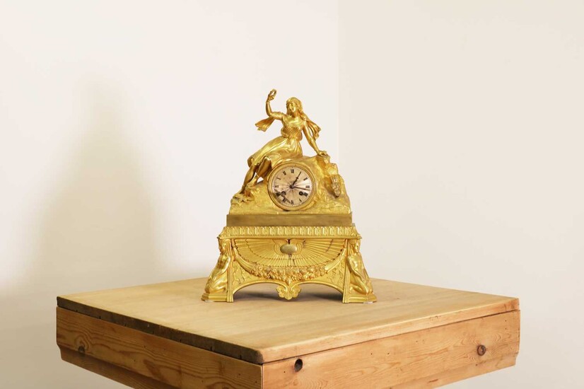 A French Egyptian Revival ormolu mantel clock