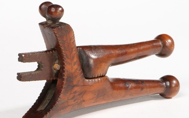 A GEORGE III YEW CROSSOVER LEVER-ACTION NUTCRACKER, POSSIBLY...
